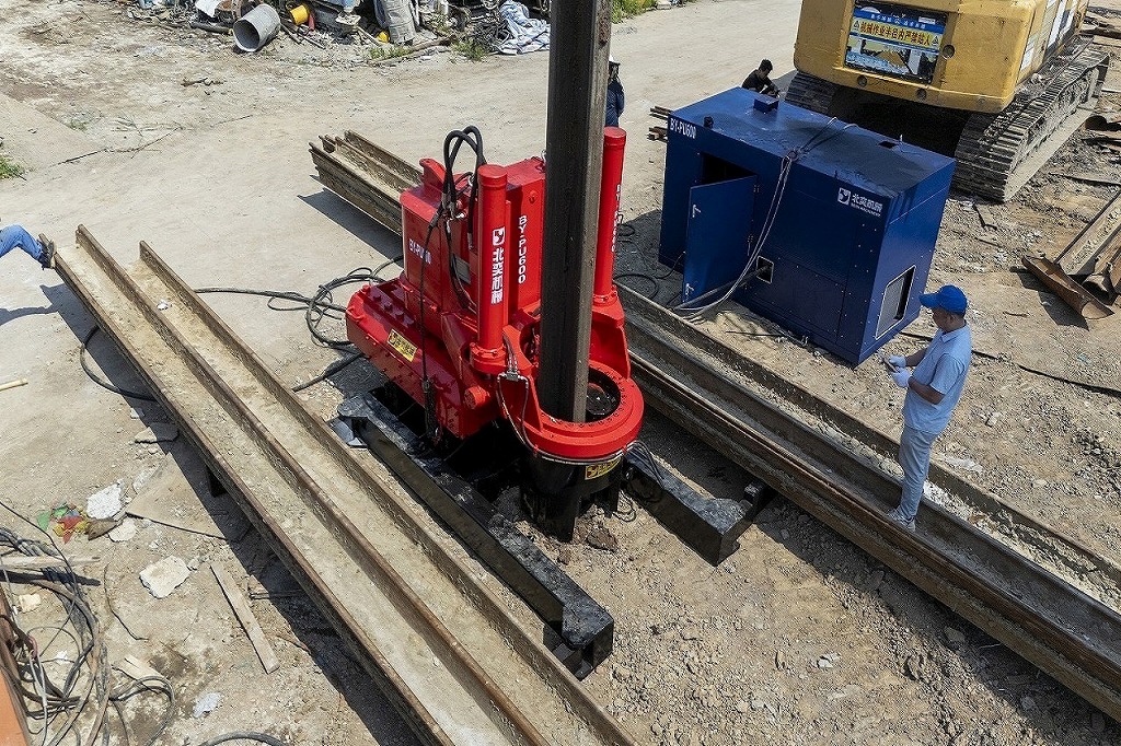 vibration-free pile driving